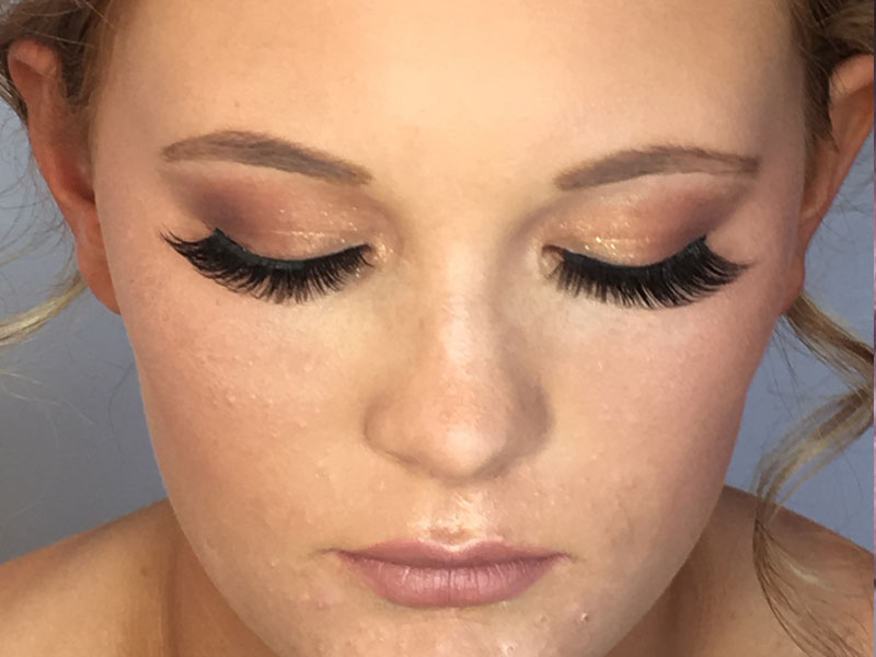 Dark lashes with gold eyeshadow York
